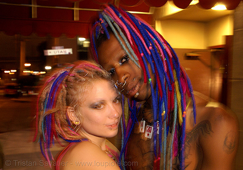 penny and page from the church of the perpetual party (san francisco), blue, church of the perpetual party, dreadlocks, man, night, page turner, penny arcade, perpetual-party.com, piercing, pink, qp, woman