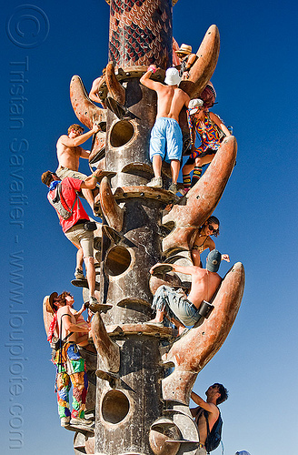 people climbing the tower, art installation, climbing, crowd, the minaret