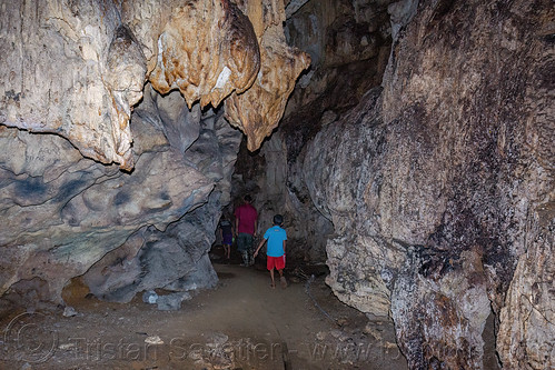 people venturing in natural cave, tana toraja