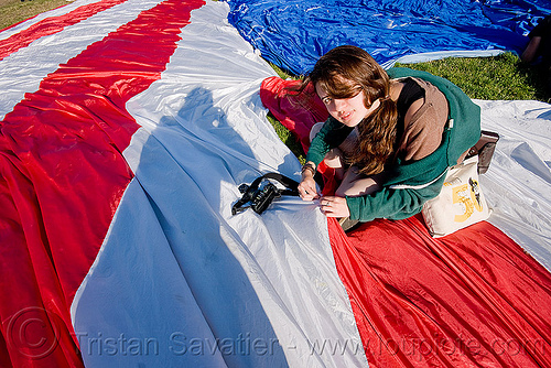 phoebe sewing the giant american flag - dolores park (san francisco), american flag, camera, giant flag, mending, phoebe, photographer, sewing, stitching, the flag project, us flag, woman