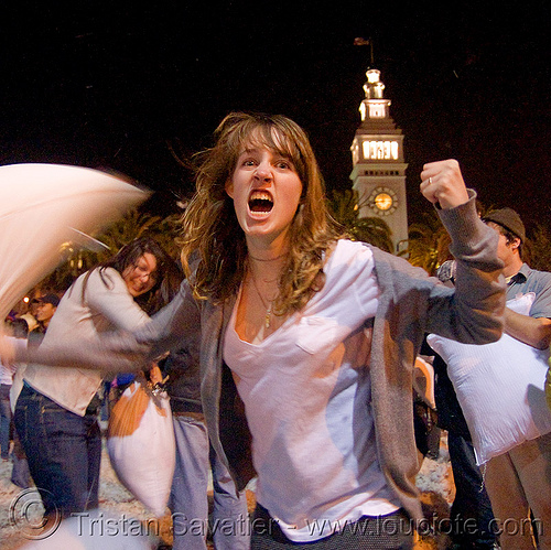 pillow warrior girl - the great san francisco pillow fight 2009, down feathers, embarcadero clock tower, night, pillows, woman, world pillow fight day