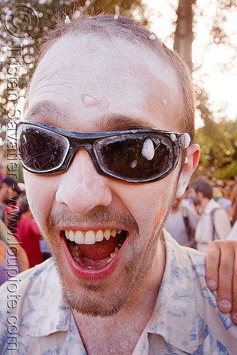 porteño celebrating the carnival in tilcara (argentina), andean carnival, argentina, carnaval de la quebrada, carnaval de tilcara, man, noroeste argentino, quebrada de humahuaca, sunglasses, talk powder