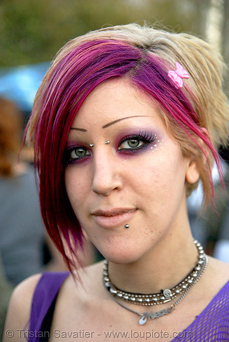 purple hair and eye makeup, lovevolution, necklaces, nose piercing, pink, shaved eyebrows, woman