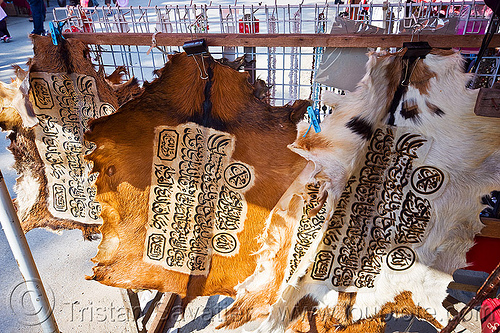 quran verses on goat skins, arabic script, borneo, goat skins, islam, islamic, malaysia, muslim, qur'an, quran verses, serikin, shop, street market, verse