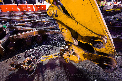 rail tongs - muni railway construction site (san francisco), attachment, diamond crossing, hydraulic arm, light rail, muni, ntk, rail tongs, railroad construction, railroad tracks, railway tracks, san francisco municipal railway, track maintenance, track work