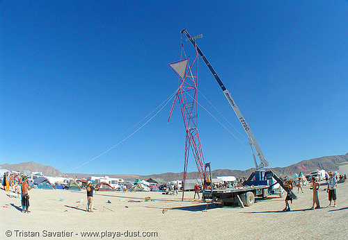 raising red man - burning man 2005, uber man, ubie