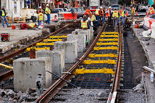 replacing tracks of the san francisco municipal railway, high-visibility jacket, high-visibility vest, light rail, man, muni, ntk, rail jacks, railroad construction, railroad tracks, railway tracks, reflective jacket, reflective vest, safety helmet, safety vest, san francisco municipal railway, track jacks, track maintenance, track work, workers