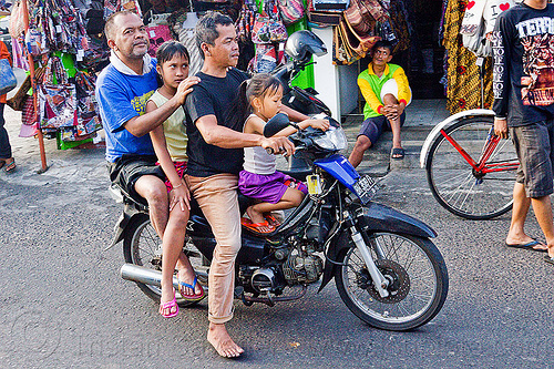 riding a motorbike in indonesia, children, kids, rider, riding, underbone motorcycle