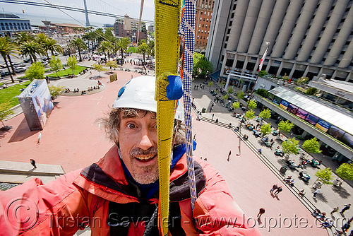 riding the zip-line over san francisco, adventure, cable line, cables, climbing helmet, embarcadero, hanging, man, mountaineering, self portrait, selfie, sling, steel cable, strap, trolley, tyrolienne, urban, zip line, zip wire