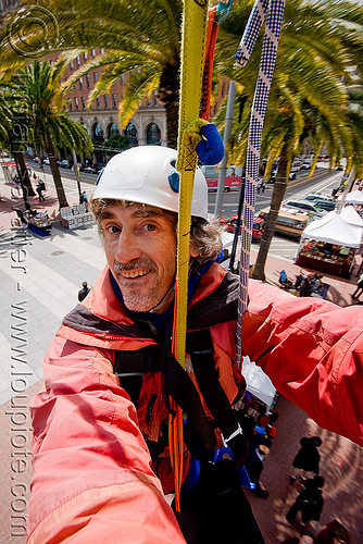 riding the zip-line over san francisco, adventure, cable line, cables, climbing helmet, embarcadero, hanging, man, mountaineering, self portrait, selfie, sling, steel cable, strap, trolley, tyrolienne, urban, zip line, zip wire