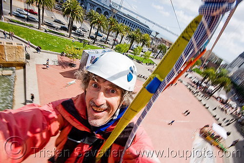 riding the zip-line over san francisco, adventure, cable line, cables, climbing helmet, embarcadero, hanging, man, mountaineering, self portrait, selfie, sling, steel cable, strap, trolley, tyrolienne, urban, zip line, zip wire