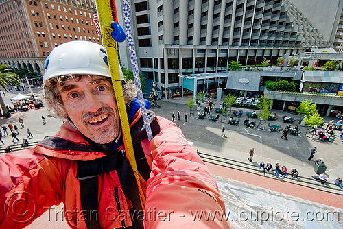 riding the zip-line over san francisco, adventure, cable line, cables, climbing helmet, embarcadero, hanging, man, mountaineering, self portrait, sling, steel cable, strap, trolley, tyrolienne, urban, zip line, zip wire