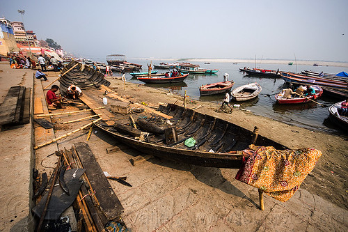 river boat construction - ghats of varanasi (india), construction, fixing, ganga, ganges river, ghats, hull, men, repairing, river boats, varanasi