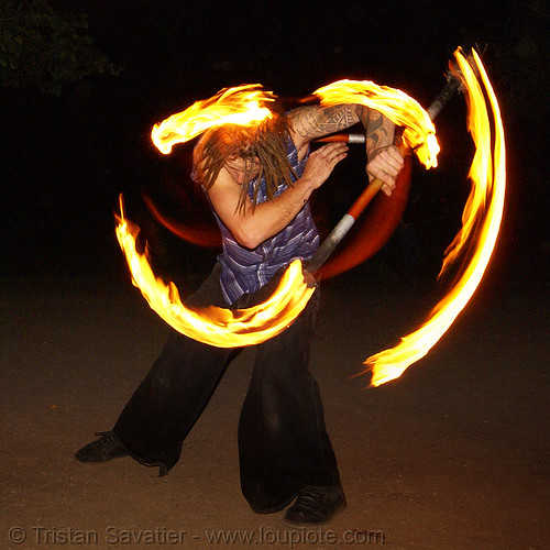 ro spinning fire staffs (san francisco), double staff, fire dancer, fire dancing, fire performer, fire spinning, fire staffs, fire staves, night, spinning fire