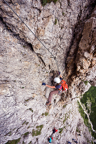 rock climbing in the dolomites - via ferrata, alps, cliff, climber, climbing harness, climbing helmet, dolomites, dolomiti, ferrata tridentina, mountain climbing, mountaineer, mountaineering, mountains, rock climbing, vertical, via ferrata brigata tridentina, woman