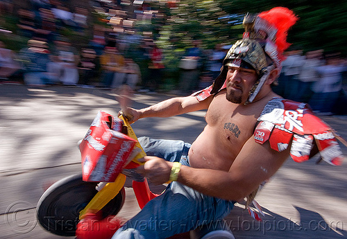 roman gladiator - byobw - "bring your own big wheel" race - toy tricycles (san francisco), big wheel, byobw 2011, drift trikes, gladiator costume, moving fast, potrero hill, race, roman costume, speed, speeding, toy tricycle, toy trike, trike-drifting