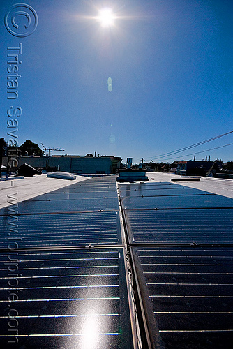 rooftop solar panels - sun, electricity, lens flare, photovoltaic array, power, rooftop, solar array, solar energy, solar panels, sun