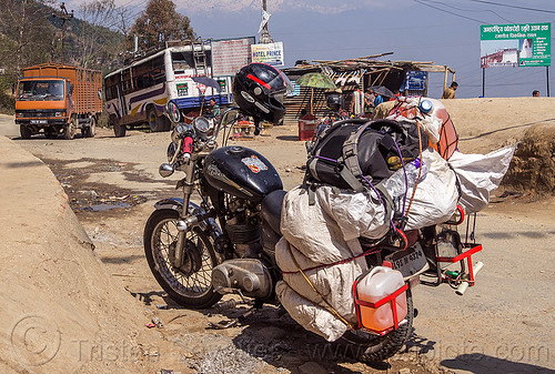 royal enfield bullet motorcycle loaded with luggage on rack (nepal), 350cc, bags, gasoline, helmet, jerrycans, luggage, motorcycle touring, road, royal enfield bullet, thunderbird