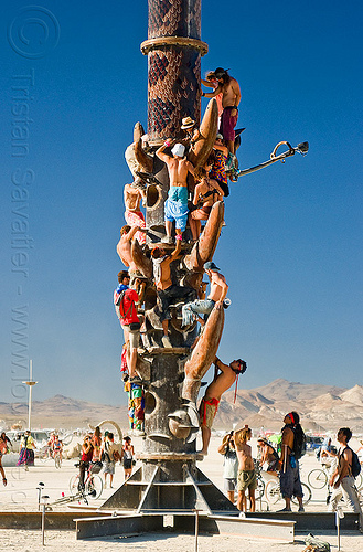 rush hour at burning man, art installation, climbing, crowd, the minaret