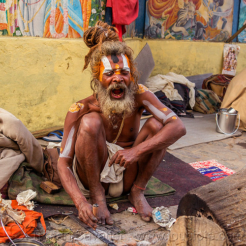 sadhu at the shivaratri hindu festival (nepal), baba smoking chillum, beard, dreadlocks, ganja, hindu, hinduism, kathmandu, knotted hair, maha shivaratri, man, pashupatinath, sadhu, screaming, smoking pipe, smoking weed, squatting, tilak, tilaka