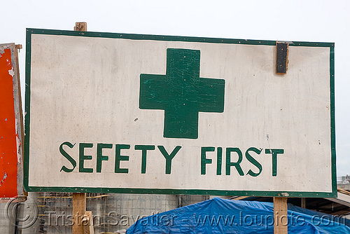 safety first sign - sefety first (sic) - nam theun 2 hydroelectric project (laos), bad spelling, construction, cross, hydro-electric, misspelled, nam theun 2 hydroelectric project, nam theun power company, ntpc, safety first, sefety first, sign, spelling mistake