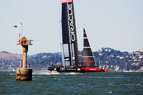 sailing hydrofoil catamaran oracle team usa near anita rock marker (san francisco bay), ac72, advertising, america's cup, anita rock, bay, boat, catamaran, fast, foiling, hydrofoil catamarans, hydrofoiling, ocean, oracle team usa, race, racing, sailboat, sailing hydrofoils, sea, ship, speed, sponsors