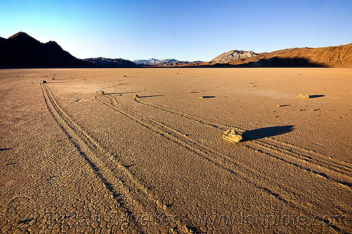 sailing rocks on the racetrack - death valley, cracked mud, death valley, dry lake, dry mud, mountains, racetrack playa, sailing stones, sliding rocks
