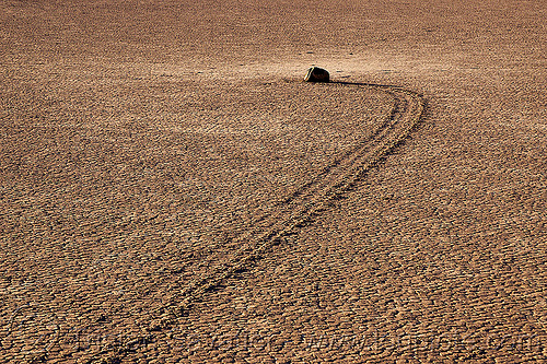 sailing stone and its track on the racetrack - death valley, cracked mud, death valley, dry lake, dry mud, racetrack playa, rock, sailing stones, sliding rocks
