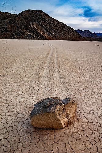 sailing stone on the racetrack - death valley, cracked mud, death valley, dry lake, dry mud, mountains, racetrack playa, sailing stones, sliding rocks