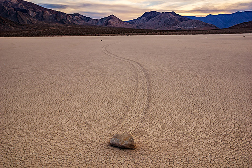 sailing stone on the racetrack - death valley, cracked mud, death valley, dry lake, dry mud, landscape, mountains, racetrack playa, sailing stones, sliding rocks