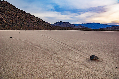 sailing stones moving in opposite directions - racetrack - death valley, cracked mud, death valley, dry lake, dry mud, landscape, mountains, racetrack playa, sailing stones, sliding rocks