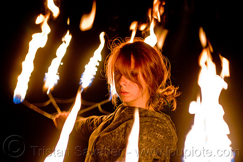 samantha with fire fans (san francisco), fire dancer, fire dancing, fire fans, fire performer, fire spinning, night, red hair, redhead, sam, samantha, spinning fire, woman