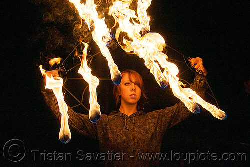 samantha with fire fans (san francisco), fire dancer, fire dancing, fire fans, fire performer, fire spinning, night, red hair, redhead, sam, samantha, spinning fire, woman