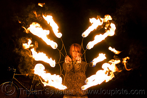 samantha with fire fans (san francisco), fire dancer, fire dancing, fire fans, fire performer, fire spinning, night, red hair, redhead, sam, samantha, spinning fire, woman