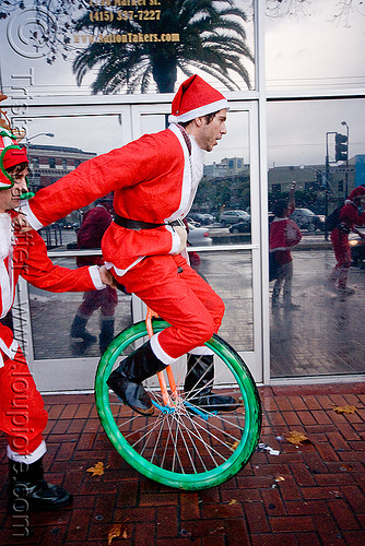 santa on unicycle - santacon 2009 - santa claus convention (san francisco), christmas, costume, man, red, santa claus, santacon, santarchy, santas, the triple crown, unicycle