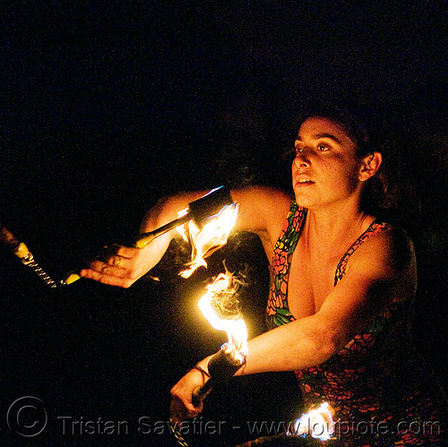 sarah with fire nunchaku, fire dancer, fire dancing, fire nunchaku, fire performer, fire spinning, night, sarah, woman