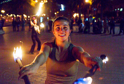 savanna spinning double fire staff, double staff, fire dancer, fire dancing, fire performer, fire spinning, fire staffs, night, savanna, staves, woman