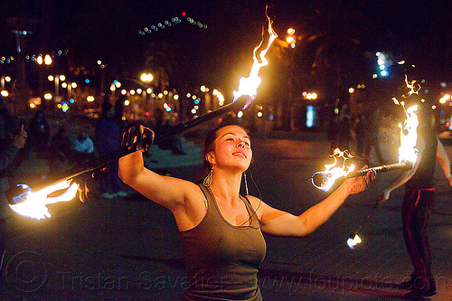 savanna spinning double fire staff, double staff, fire dancer, fire dancing, fire performer, fire spinning, fire staffs, night, savanna, staves, woman