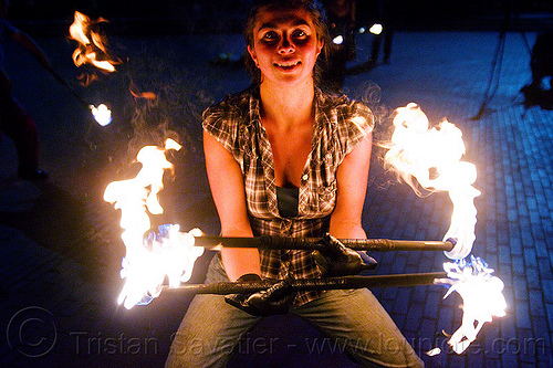 savanna spinning fire staffs, double staff, fire dancer, fire dancing, fire performer, fire spinning, fire staffs, fire staves, leather gloves, night, savanna, spinning fire, woman