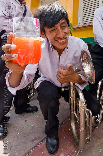 saxhorn player - banda rey imperial from potosi - carnaval - carnival in jujuy capital (argentina), andean carnival, argentina, banda rey imperial, carnaval de la quebrada, drink, jujuy capital, man, marching band, noroeste argentino, san salvador de jujuy, saxhorn