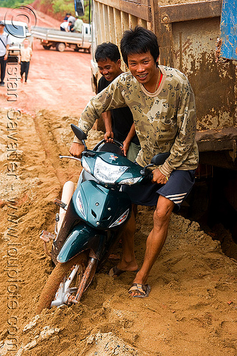 scooter and truck stuck in mud (laos), lorry, mud, rider, riding, road, ruts, truck, underbone motorcycle