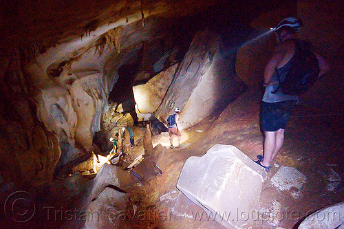 scrambling around big blocks - clearwater cave - mulu (borneo), blocks, borneo, cavers, caving, clearwater cave system, clearwater connection, gunung mulu national park, knotted rope, malaysia, natural cave, roland, spelunkers, spelunking