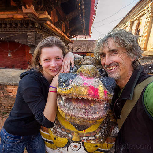 selfie with anne-laure and a colorful stone lion, anne-laure, hinduism, man, nuwakot durbar, saat taale durbar, sculpture, self-portrait, selfie, statue, stone lion, temple, woman