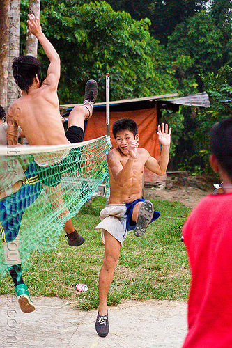 sepak raga players, ball game, borneo, gunung mulu national park, kick volleyball, malaysia, men, net, panan, penan people, player, playing, sepak raga, sepak takraw, sport