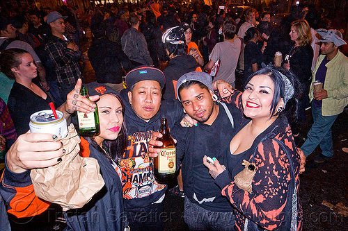 sf giants fans celebrating, 2012 world series, alcohol, baseball fans, beer, celebrating, crowd, drinking, editorial, go giants, night, paper bag, partying, sf giants, sports fans, street party