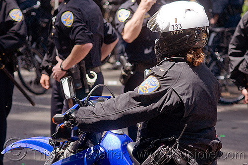 sfpd motorcycle riot police at the bay to breakers (san francisco), bay to breakers, crack-down, law enforcement, motorcycle unit, rider, riding, riot police, sfpd, street party, uniform, woman