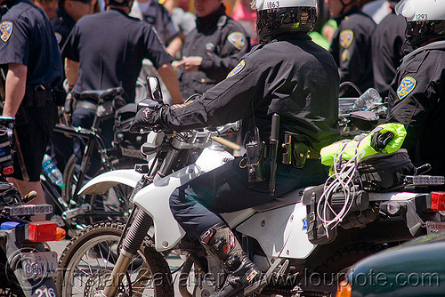 sfpd motorcycle riot police crack-down at the bay to breakers (san francisco), bay to breakers, crack-down, flex cuffs, law enforcement, men, motorcycle unit, motorcycles, plastic handcuffs, rider, riding, riot police, sfpd, street party, uniform, zip-ties