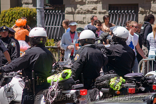 sfpd riot police on motorcycle at the bay to breakers (san francisco), bay to breakers, crack-down, law enforcement, men, motorcycle unit, motorcycles, rider, riding, riot police, sfpd, street party, uniform
