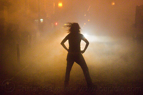 silhouette in the smoke - aftermath of chinese new year firecrackers street celebration - chinatown (san francisco), backlight, chinatown bang, chinese new year, firecrackers, lunar new year, night, pyrotechnics, silhouette, smoke, woman