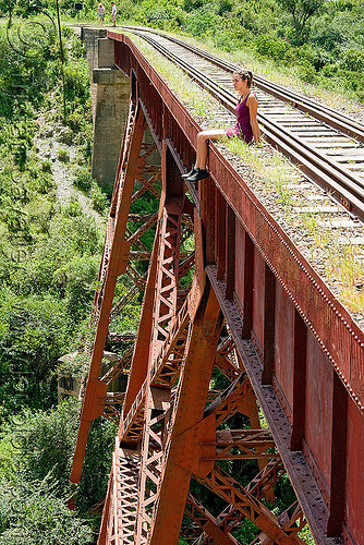 sitting at the edge - railroad viaduct, argentina, guard rails, maïlys, metric gauge, narrow gauge, noroeste argentino, rail bridge, railroad bridge, railroad tracks, railroad viaduct, railway tracks, rio toro, single track, steel, tren a las nubes, truss, viaducto del toro, woman